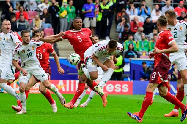 Manuel Akanji 5 Switzerland in duel, action, with Adam Nagy 8 Hungary , Hungary vs Switzerland, Football, UEFA Euro 2024, Group stage, Matchday 1, 15 06 2024 Cologne North Rhine-Westphalia Germany Copyright: xkolbert-press MarcxNiemeyerx