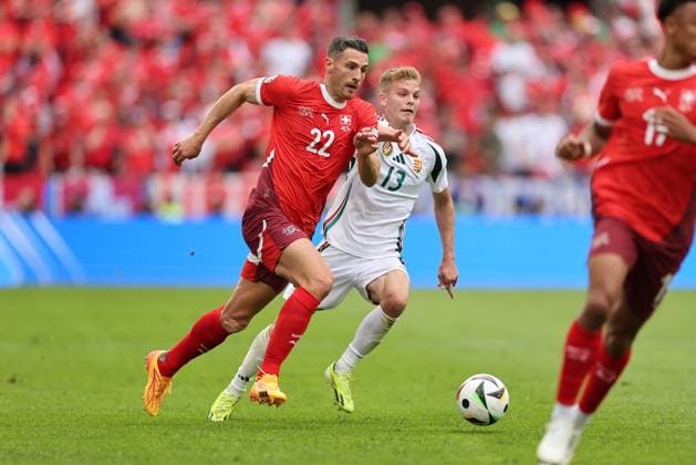15 06 2024, European Football Championship, UEFA EURO 2024, Hungary Switzerland, Group A, Cologne Stadium, f l , Fabian Schär Switzerland , Andras Schäfer Hungary Copyright: HMBxMedia