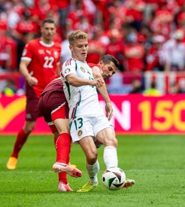 Football, Men, Season 2023 24, Euro 2024 Group A 1 Matchday in Cologne, Hungary Switzerland, f l Remo Freuler Switzerland , Andras Schäfer Hungary , 15 06 2024, Copyright: xSebastianxRäppold MatthiasxKochx