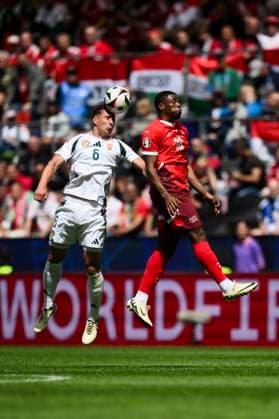 Hungary v Switzerland - UEFA EURO, EM, Europameisterschaft,Fussball 2024 6hu competes for a header with Kwadwo Duah of Switzerland during the UEFA EURO 2024 group stage football match between Hungary and Switzerland. Cologne Germany Copyright: xNicolòxCampox