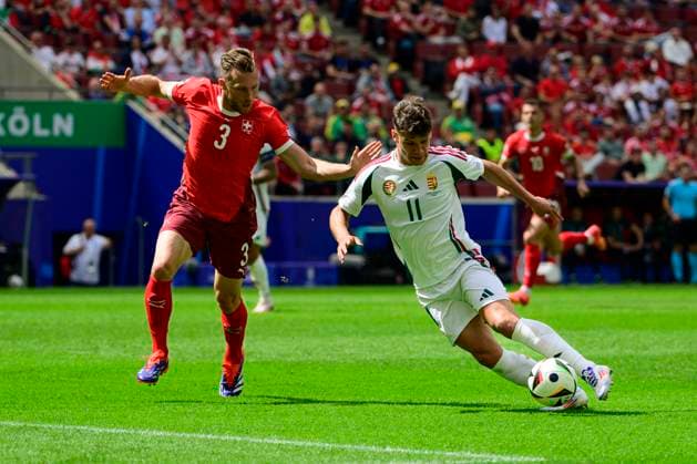 Silvan Widmer 3 Switzerland in duel, action, with Milos Kerkez 11 Hungary , Hungary vs Switzerland, Football, UEFA Euro 2024, Group stage, Matchday 1, 15 06 2024 Cologne North Rhine-Westphalia Germany Copyright: xkolbert-press MarcxNiemeyerx