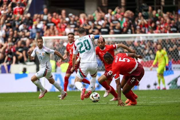 Roland Sallai Hungary, 20 with Manuel Akanji Switzerland, 05 , Football, UEFA , European Championship, Group A 2024, Hungary vs Switzerland Cologne Cologne Stadium North Rhine-Westphalia Germany Copyright: xGrantxHubbsx