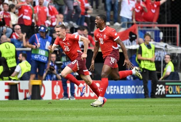 Cheering 1 0 Kwadwo Duah Switzerland , right , and Michel Aebischer Switzerland 15 06 2024, European Football Championship 2024, Preliminary round, 1 Matchday Hungary Switzerland Cologne Rhein Energie Stadium North Rhine-Westphalia Germany Team2
