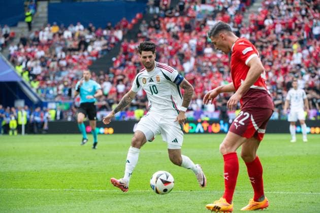 Dominik Szoboszlai Hungary, 10 in duel with Fabian Schaer Switzerland, 22 , GER, Hungary HUN vs Switzerland SUI , European Football Championship, UEFA EURO 2024, Group A, Matchday 1, 15 06 2024 GER, Hungary HUN vs Switzerland SUI , European Football Championship, UEFA EURO 2024, Group A, Matchday 1, 15 06 2024 Koeln Copyright: xEibner-Pressefoto Memmlerx EP_MMR