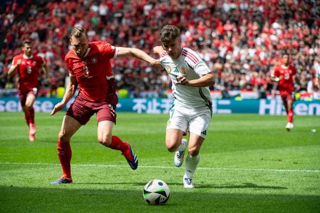 Silvan Widmer Switzerland, 03 in duel with Milos Kerkez Hungary, 11 , GER, Hungary HUN vs Switzerland SUI , European Football Championship, UEFA EURO 2024, Group A, Matchday 1, 15 06 2024 GER, Hungary HUN vs Switzerland SUI , European Football Championship, UEFA EURO 2024, Group A, Matchday 1, 15 06 2024 Cologne Copyright: xEibner-Pressefoto Memmlerx EP_MMR