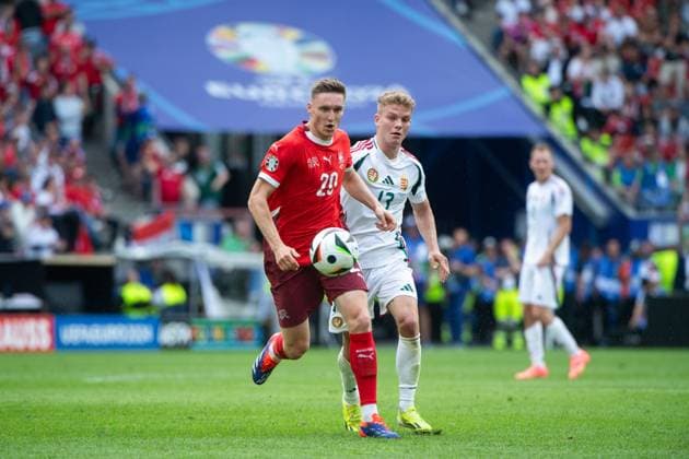 Michael Aebischer Switzerland, 20 in duel with Andras Schaefer Hungary, 13 , GER, Hungary HUN vs Switzerland SUI , European Football Championship, UEFA EURO 2024, Group A, Matchday 1, 15 06 2024 GER, Hungary HUN vs Switzerland SUI , European Football Championship, UEFA EURO 2024, Group A, Matchday 1, 15 06 2024 Cologne Copyright: xEibner-Pressefoto Memmlerx EP_MMR