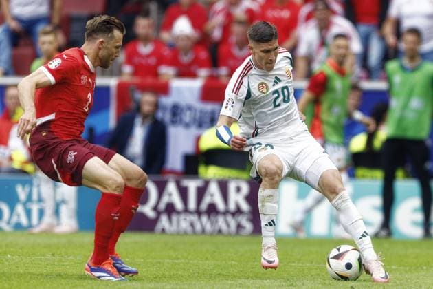 COLOGNE, RheinEnergie Stadium, 15-06-2024 , European Football Championship Euro2024, Group stage match no.2 between Hungary and Switzerland. Hungary player Roland Sallai and Switzerland player Silvan Widmer Hungary - Switzerland (Euro2024)  x25495035x Copyright: