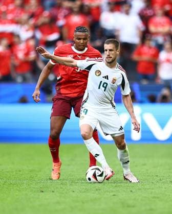 Barnabas Varga of Hungary is challenged by Manuel Akanji of Switzerland Hungary v Switzerland, UEFA European Championship, EM, Europameisterschaft 2024, Group A, Football, Cologne Stadium, Cologne, Germany, 15 Jun 2024 EDITORIAL USE ONLY No use with unauthorised audio, video, data, fixture lists, club league logos or live services. Online in-match use limited to 120 images, no video emulation. No use in betting, games or single club league player publications.  Copyright: xMichaelxZemanek Shutterstockx 14539265bb
