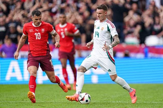 2024-06-15 Hungary v Switzerland - Group A - UEFA EURO, EM, Europameisterschaft,Fussball 2024 COLOGNE, GERMANY - JUNE 15: Granit Xhaka of Switzerland, Bendeguz Bolla of Hungary battle for the ball during the Group A - UEFA EURO 2024 match between Hungary and Switzerland at Cologne Stadium on June 15, 2024 in Cologne, Germany. (Photo by Joris Verwijst BSR Agency) Cologne Germany Content not available for redistribution in The Netherlands directly or indirectly through any third parties. Copyright: xBSRxAgencyx