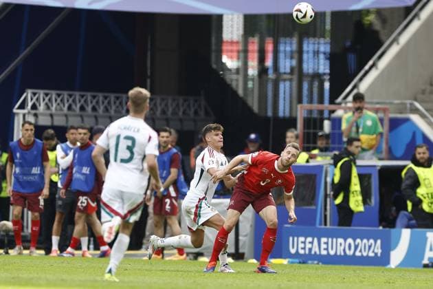 COLOGNE, RheinEnergie Stadium, 15-06-2024 , European Football Championship Euro2024, Group stage match no.2 between Hungary and Switzerland. Hungary player Milos Kerkez and Switzerland player Silvan Widmer Hungary - Switzerland (Euro2024)  x25495173x Copyright: