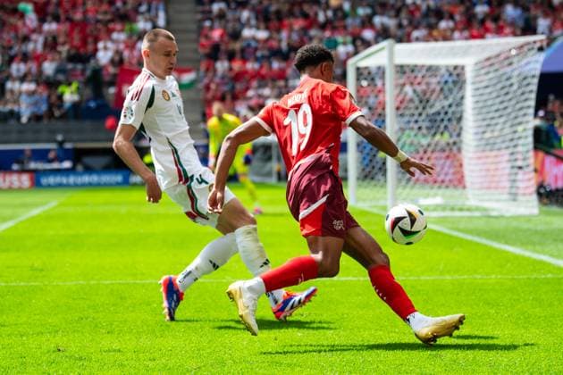 Hungary v Switzerland: Group A - UEFA EURO, EM, Europameisterschaft,Fussball 2024 Attila Szalai of Hungary is confronting Dan Ndoye of Switzerland (L-R),during the UEFA Euro 2024 Group A football match between Hungary and Switzerland at the Cologne Stadium in Cologne on June 15, 2024. Cologne Germany  Copyright: xHeshamxElsherifx originalFilename:elsherif-notitle240615_np2cv.jpg