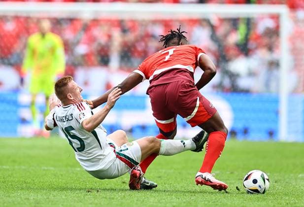 Laszlo Kleinheisler of Hungary and Breel Embolo of Switzerland compete for the ball Hungary v Switzerland, UEFA European Championship, EM, Europameisterschaft 2024, Group A, Football, Cologne Stadium, Cologne, Germany, 15 Jun 2024 EDITORIAL USE ONLY No use with unauthorised audio, video, data, fixture lists, club league logos or live services. Online in-match use limited to 120 images, no video emulation. No use in betting, games or single club league player publications.  Copyright: xMichaelxZemanek Shutterstockx 14539265bv