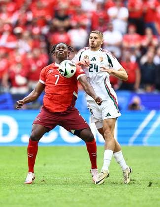 Breel Embolo of Switzerland is challenged by Marton Dardai of Hungary Hungary v Switzerland, UEFA European Championship, EM, Europameisterschaft 2024, Group A, Football, Cologne Stadium, Cologne, Germany, 15 Jun 2024 EDITORIAL USE ONLY No use with unauthorised audio, video, data, fixture lists, club league logos or live services. Online in-match use limited to 120 images, no video emulation. No use in betting, games or single club league player publications.  Copyright: xMichaelxZemanek Shutterstockx 14539265bx