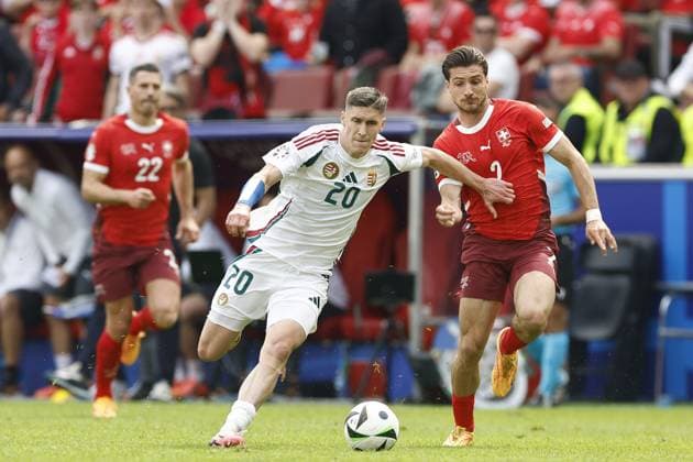 COLOGNE, RheinEnergie Stadium, 15-06-2024 , European Football Championship Euro2024, Group stage match no.2 between Hungary and Switzerland. Hungary player Roland Sallai and Switzerland player Leonidas Stergiou Hungary - Switzerland (Euro2024)  x25495259x Copyright: