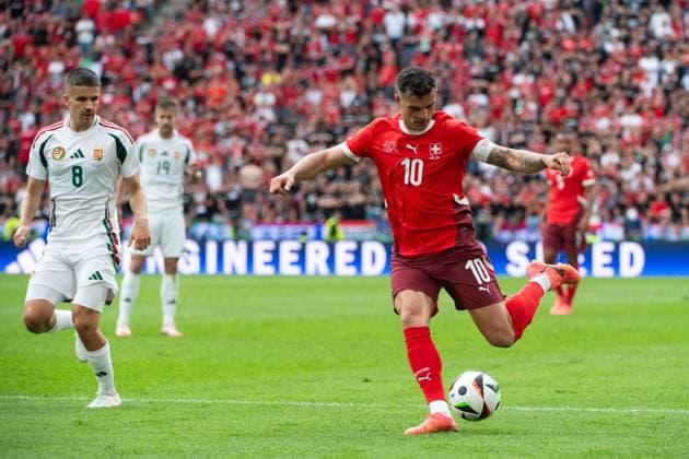 Granit Xhaka Switzerland, 10 on the ball, next to Adam Nagy Hungary, 08 , GER, Hungary HUN vs Switzerland SUI , European Football Championship, UEFA EURO 2024, Group A, Matchday 1, 15 06 2024 GER, Hungary HUN vs Switzerland SUI , European Football Championship, UEFA EURO 2024, Group A, Matchday 1, 15 06 2024 Cologne Copyright: xEibner-Pressefoto Memmlerx EP_MMR