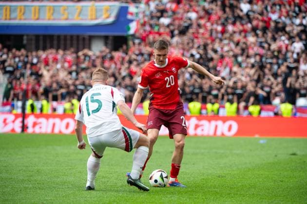 Michael Aebischer Switzerland, 20 in duel with Laszio Kleinheisler Hungary, 15 , GER, Hungary HUN vs Switzerland SUI , European Football Championship, UEFA EURO 2024, Group A, Matchday 1, 15 06 2024 GER, Hungary HUN vs Switzerland SUI , European Football Championship, UEFA EURO 2024, Group A, Matchday 1, 15 06 2024 Cologne Copyright: xEibner-Pressefoto Memmlerx EP_MMR