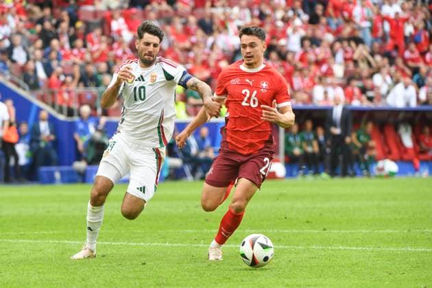 COLOGNE, GERMANY JUNE 15 Fabian Rieder of Switzerland R against Dominik Szoboszlai of Hungary L during the UEFA EURO 2024 group stage match between Hungary and Switzerland at Cologne Stadium on June 15, 2024 in Cologne, Germany Cologne Cologne Stadium North Rhine Westphalia Germany Copyright: xJustPictures.ch ManuelxWinterbergerx jp-en-EuSpIm-MWI_7896