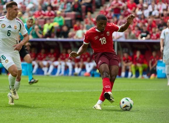 (240615) -- COLOGNE, June 15, 2024 -- Kwadwo Duah of Switzerland shoots to score during the UEFA EURO, EM, Europameisterschaft,Fussball 2024 Group A match between Hungary and Switzerland in Cologne, Germany, June 15, 2024. ) (SP)GERMANY-COLOGNE-FOOTBALL-EURO 2024-SWITZERLAND VS HUNGARY MengxDingbo 