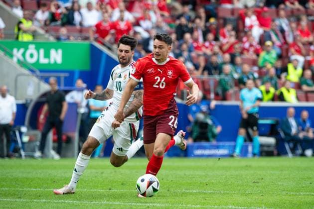 Fabian Rieder Switzerland, 26 in duel with Dominik Szoboszlai Hungary, 10 , GER, Hungary HUN vs Switzerland SUI , European Football Championship, UEFA EURO 2024, Group A, Matchday 1, 15 06 2024 GER, Hungary HUN vs Switzerland SUI , European Football Championship, UEFA EURO 2024, Group A, Matchday 1, 15 06 2024 Cologne Copyright: xEibner-Pressefoto Memmlerx EP_MMR