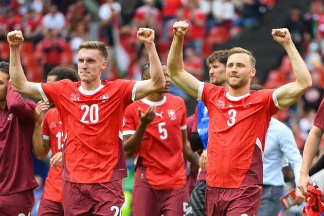 COLOGNE, GERMANY JUNE 15 Michel Aebischer of Switzerland L and Silvan Widmer of Switzerland R celebrates victory after the UEFA EURO 2024 group stage match between Hungary and Switzerland at Cologne Stadium on June 15, 2024 in Cologne, Germany Cologne Cologne Stadium North Rhine Westphalia Germany Copyright: xJustPictures.ch ManuelxWinterbergerx jp-en-EuSpIm-MWI_7938