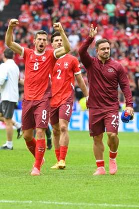 COLOGNE, GERMANY JUNE 15 Remo Freuler of Switzerland L and Xherdan Shaqiri of Switzerland thanks the fans after the UEFA EURO 2024 group stage match between Hungary and Switzerland at Cologne Stadium on June 15, 2024 in Cologne, Germany Cologne Cologne Stadium North Rhine Westphalia Germany Copyright: xJustPictures.ch ManuelxWinterbergerx jp-en-EuSpIm-MWI_7942