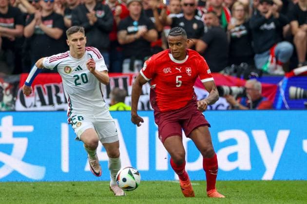 Manuel Akanji Switzerland, 05 and Roland Sallai Hungary, 20 in duel , Football, UEFA , European Championship, Group A 2024, Hungary vs Switzerland Cologne Cologne Stadium Nordrhein Westfalen Germany Copyright: xGrantxHubbsx