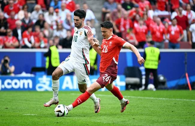Football, European Championship, EURO 2024, Group A, Rhein Energie Stadium Cologne Hungary Switzerland 3 1 Fabian Rieder SUI , Dominik Szoboszlai HUN Action