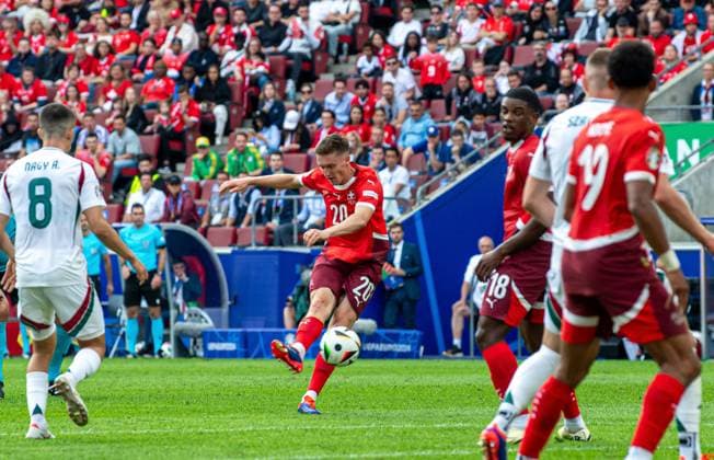 Soccer, Men, Season 2023 24, Euro 2024 Group A 1 Matchday in Cologne, Hungary Switzerland, Michel Aebischer Switzerland scores the goal to 0 2, 15 06 2024, Copyright: xSebastianxRäppold MatthiasxKochx
