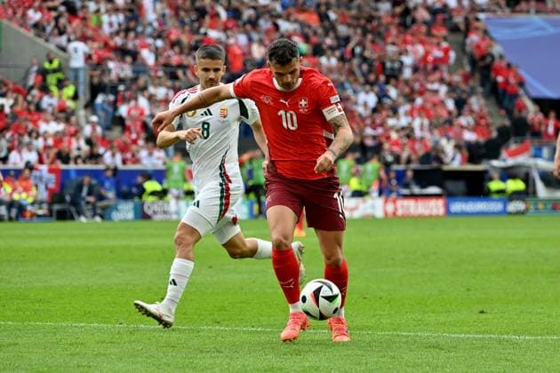 15 06 2024, xjrdrx, Football EM 2024, Hungary Switzerland emspor, v l Adam Nagy Hungary Granit Xhaka Switzerland duel, action, action, battle for the ball DFL DFB REGULATIONS PROHIBIT ANY USE OF PHOTOGRAPHS as IMAGE SEQUENCES and or QUASI VIDEO Köln