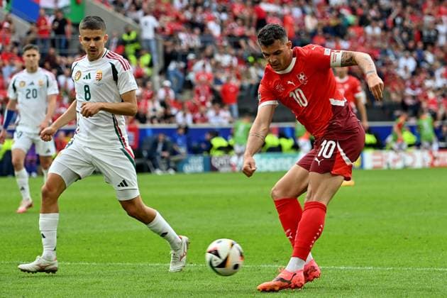 15 06 2024, xjrdrx, Football EM 2024, Hungary Switzerland emspor, v l Adam Nagy Hungary Granit Xhaka Switzerland duel, action, action, battle for the ball DFL DFB REGULATIONS PROHIBIT ANY USE OF PHOTOGRAPHS as IMAGE SEQUENCES and or QUASI VIDEO Köln