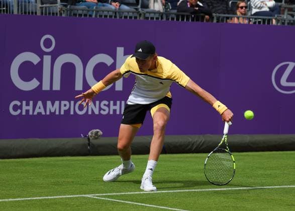 15th June 2024; Cinch Championships, Queens Club, West Kensington, London, England: Cinch Championships Queens Club, Qualifying Day 1; Henry Searle (GBR) with a backhand shot to Rinky Hijikata (AUS)  ActionPlus12654908 JohnxPatrickxFletcher
