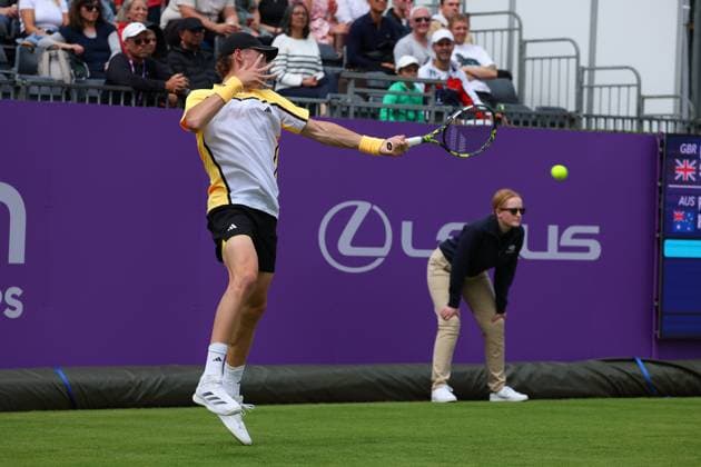 15th June 2024; Cinch Championships, Queens Club, West Kensington, London, England: Cinch Championships Queens Club, Qualifying Day 1; Henry Searle (GBR) with a forehand shot to Rinky Hijikata (AUS)  ActionPlus12654910 JohnxPatrickxFletcher