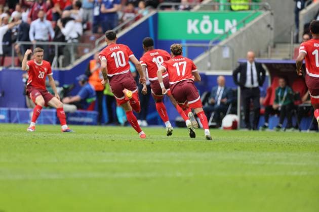 (240615) -- COLOGNE, June 15, 2024 -- Players of Switzerland celebrate scoring during the UEFA EURO, EM, Europameisterschaft,Fussball 2024 Group A match between Hungary and Switzerland in Cologne, Germany, June 15, 2024. ) (SP)GERMANY-COLOGNE-FOOTBALL-EURO 2024-SWITZERLAND VS HUNGARY MengxDingbo 