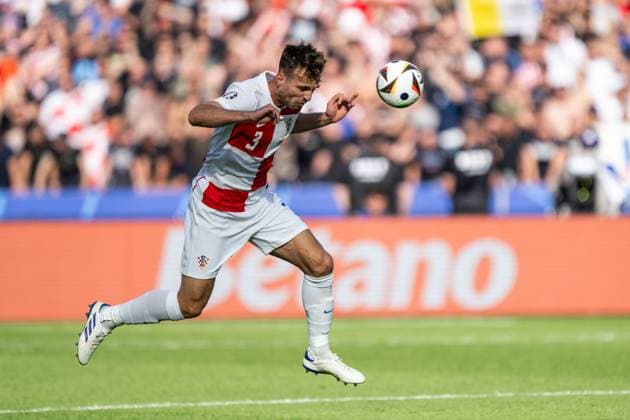 240615 Marin Pongracic of Croatia during the UEFA Euro 2024 Football Championship match between Spain and Croatia on June 15, 2024 in Berlin Photo Mathias Bergeld BILDBYRAN kod MB MB0935 fotboll football soccer fotballs em europamästerskap em uefa euro uefa european football championship euro 2024 spanien spain kroatien croatia bbeng  Copyright: MATHIASxBERGELD BB240615MB038