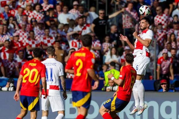 Spain v Croatia: Group B - UEFA EURO, EM, Europameisterschaft,Fussball 2024 BERLIN, GERMANY - JUNE 15: Josip Sutalo of Croatia jump for a header during the UEFA EURO 2024 group stage match between Spain and Croatia at Olympiastadion on June 15, 2024 in Berlin, Germany. LukaxStanzl PIXSELL