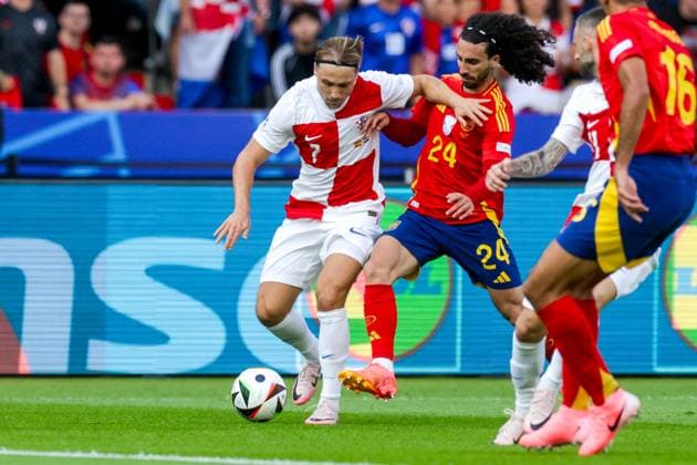 Spain v Croatia: Group B - UEFA EURO, EM, Europameisterschaft,Fussball 2024 BERLIN, GERMANY - JUNE 15: Lovro Majer of Croatia battles for possession with Marc Cucurella of Spain during the UEFA EURO 2024 group stage match between Spain and Croatia at Olympiastadion on June 15, 2024 in Berlin, Germany. LukaxStanzl PIXSELL