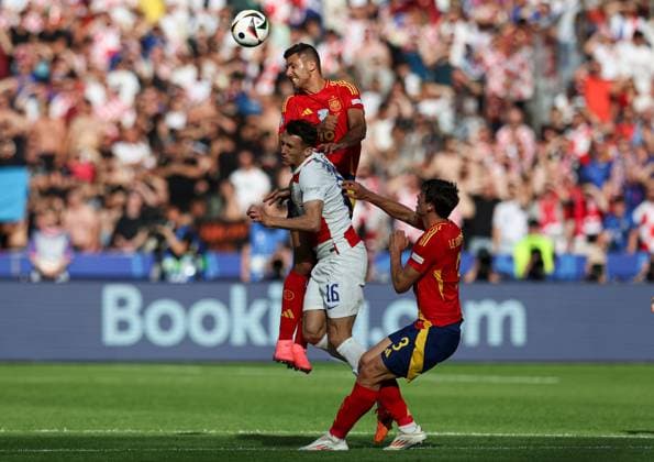 Rodri of Spain battles with Ante Budimir of Croatia in the air Spain v Croatia, UEFA European Championship, EM, Europameisterschaft 2024, Group B, Football, Olympiastadion, Berlin, Germany, 15 Jun 2024 EDITORIAL USE ONLY No use with unauthorised audio, video, data, fixture lists, club league logos or live services. Online in-match use limited to 120 images, no video emulation. No use in betting, games or single club league player publications.  Copyright: xMattxWest Shutterstockx 14539284an