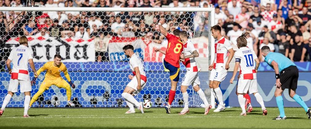 15th June 2024; Olympiastadion, Berlin, Germany; Euro 2024 Group B Football, Spain versus Croatia; Dominik Livakovic (CRO) beaten by the shot and goal from Fabian Ruiz (ESP) for 2-0 in the 32nd minute  ActionPlus12654962 TomaszxJastrzebowski