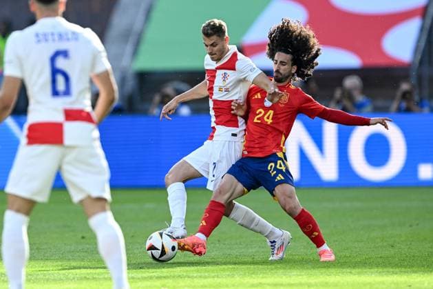 Spain v Croatia: Group B - UEFA EURO, EM, Europameisterschaft,Fussball 2024 BERLIN, GERMANY - JUNE 15: Josip Stanisic of Croatia competes for the ball with Marc Cucurella of Spain during the UEFA EURO 2024 group stage match between Spain and Croatia at Olympiastadion on June 15, 2024 in Berlin, Germany. MarkoxLukunic PIXSELL