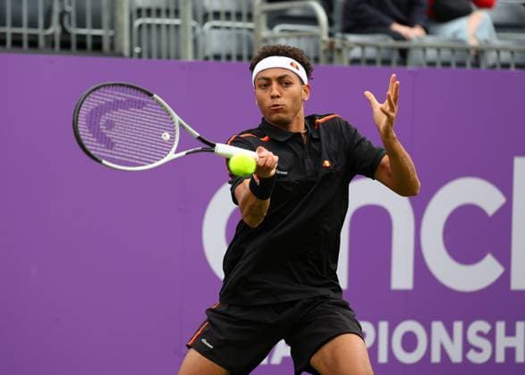 15th June 2024; Cinch Championships, Queens Club, West Kensington, London, England: Cinch Championships Queens Club, Qualifying Day 1; Paul Jubb (GBR) with a forehand shot to Mackenzie McDonald (USA)  ActionPlus12654965 JohnxPatrickxFletcher