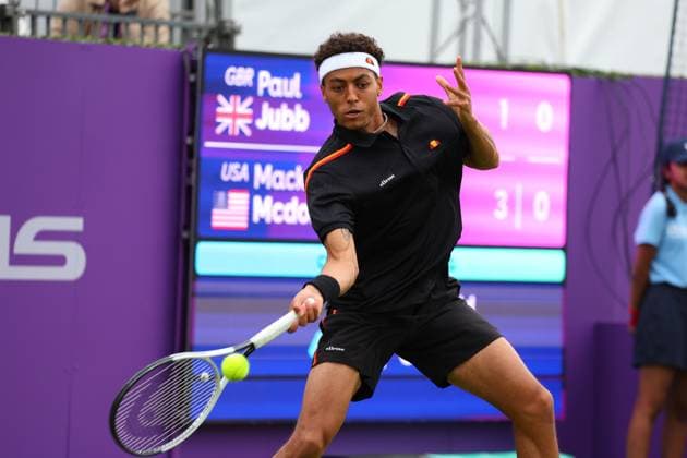 15th June 2024; Cinch Championships, Queens Club, West Kensington, London, England: Cinch Championships Queens Club, Qualifying Day 1; Paul Jubb (GBR) with a forehand shot to Mackenzie McDonald (USA)  ActionPlus12654968 JohnxPatrickxFletcher