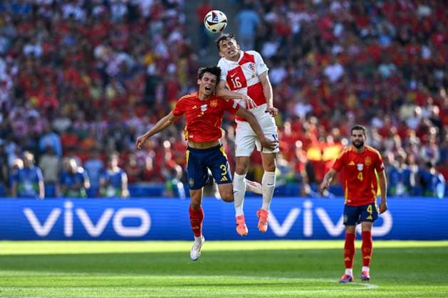Spain v Croatia: Group B - UEFA EURO, EM, Europameisterschaft,Fussball 2024 BERLIN, GERMANY - JUNE 15: Robin Le Normand of Spain and Ante Budimir of Croatia jump for a header during the UEFA EURO 2024 group stage match between Spain and Croatia at Olympiastadion on June 15, 2024 in Berlin, Germany. MarkoxLukunic PIXSELL