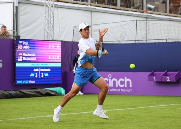 15th June 2024; Cinch Championships, Queens Club, West Kensington, London, England: Cinch Championships Queens Club, Qualifying Day 1; Mackenzie McDonald (USA) with a forehand shot to Paul Jubb (GBR)  ActionPlus12654982 JohnxPatrickxFletcher