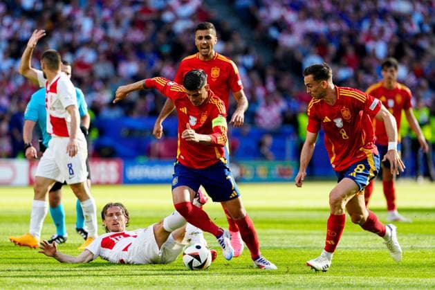 Ãlvaro Morata of Spain (R) battles with Luka Modric of Croatia (L) Spain v Croatia, UEFA European Championship, EM, Europameisterschaft 2024, Group B, Football, Olympiastadion, Berlin, Germany, 15 Jun 2024 EDITORIAL USE ONLY No use with unauthorised audio, video, data, fixture lists, club league logos or live services. Online in-match use limited to 120 images, no video emulation. No use in betting, games or single club league player publications. Copyright: xDavexShopland Shutterstockx 14539285bc
