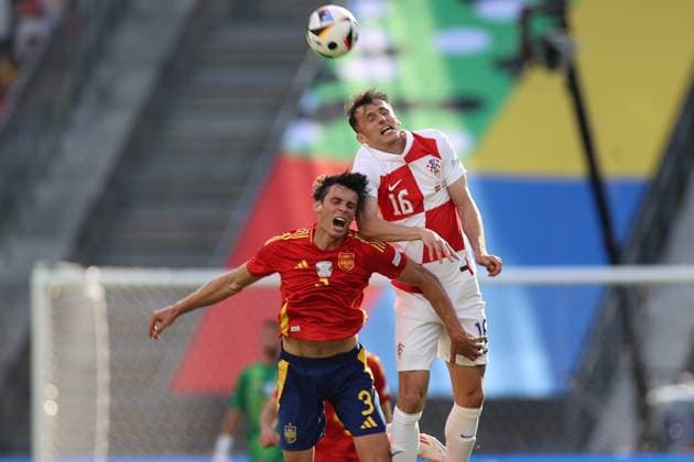Spain v Croatia: Group B - UEFA EURO, EM, Europameisterschaft,Fussball 2024. Robin Le Normand of Spain and Ante Budimir of Croatia are playing during the UEFA EURO 2024 group stage match between Spain and Croatia at Olympiastadion Berlin in Berlin, Germany, on June 15, 2024. Berlin Germany  Copyright: xMohamadxHosainix originalFilename:amirhosseini-spainvcr240615_npfyF.jpg