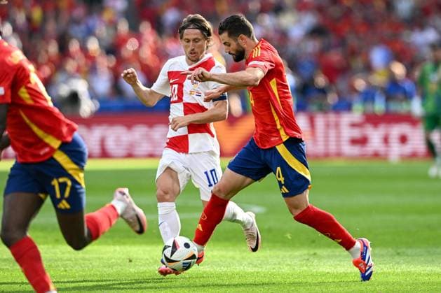 Spain v Croatia: Group B - UEFA EURO, EM, Europameisterschaft,Fussball 2024 BERLIN, GERMANY - JUNE 15: Nacho of Spain is challenged by Luka Modric of Croatia during the UEFA EURO 2024 group stage match between Spain and Croatia at Olympiastadion on June 15, 2024 in Berlin, Germany. MarkoxLukunic PIXSELL