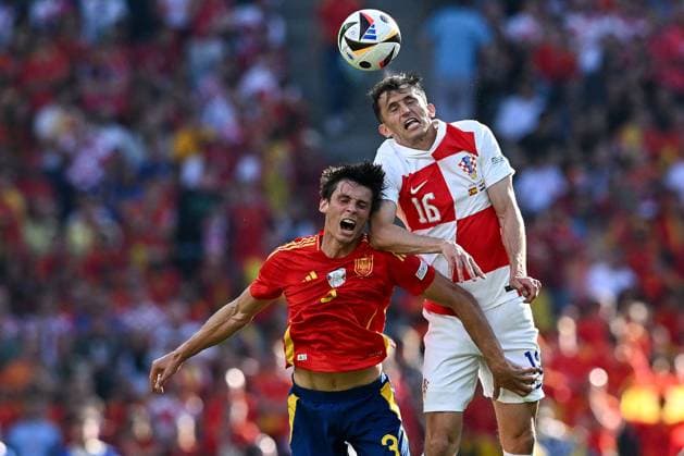 Spain v Croatia: Group B - UEFA EURO, EM, Europameisterschaft,Fussball 2024 BERLIN, GERMANY - JUNE 15: Robin Le Normand of Spain competes for the ball with Ante Budimir of Croatia during the UEFA EURO 2024 group stage match between Spain and Croatia at Olympiastadion on June 15, 2024 in Berlin, Germany. MarkoxLukunic PIXSELL