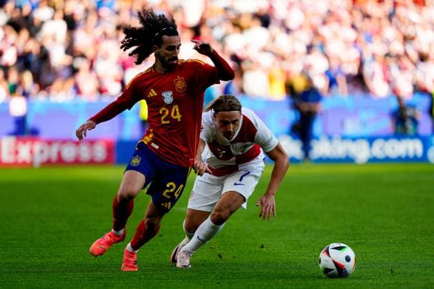 Marc Cucurella of Spain (L) battles with Lovro Majer of Croatia (R) Spain v Croatia, UEFA European Championship, EM, Europameisterschaft 2024, Group B, Football, Olympiastadion, Berlin, Germany, 15 Jun 2024 EDITORIAL USE ONLY No use with unauthorised audio, video, data, fixture lists, club league logos or live services. Online in-match use limited to 120 images, no video emulation. No use in betting, games or single club league player publications.  Copyright: xDavexShopland Shutterstockx 14539285cl