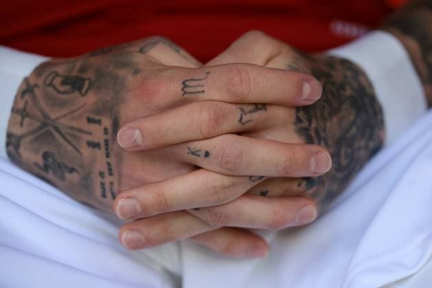 Cologne, Germany, 15th June 2024. Tattoos on the arms of Hungary substitutes prior to the UEFA European Championships match at Cologne Stadium, Cologne. Picture credit should read: Jonathan Moscrop Sportimage EDITORIAL USE ONLY. No use with unauthorised audio, video, data, fixture lists, club league logos or live services. Online in-match use limited to 120 images, no video emulation. No use in betting, games or single club league player publications. SPI-3181-0064