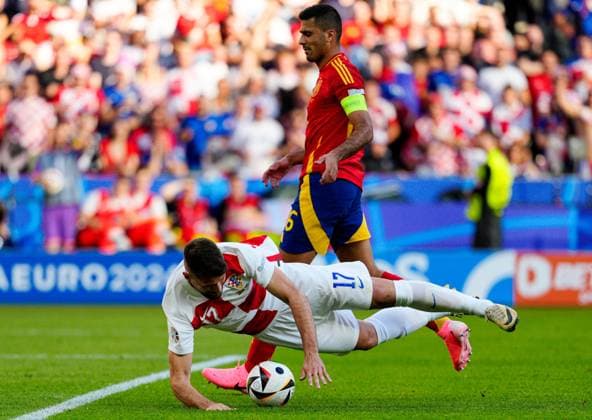 Rodri of Spain fouls Bruno Petkovic of Croatia in the box and concedes a penalty Spain v Croatia, UEFA European Championship, EM, Europameisterschaft 2024, Group B, Football, Olympiastadion, Berlin, Germany, 15 Jun 2024 EDITORIAL USE ONLY No use with unauthorised audio, video, data, fixture lists, club league logos or live services. Online in-match use limited to 120 images, no video emulation. No use in betting, games or single club league player publications.  Copyright: xDavexShopland Shutterstockx 14539285cx